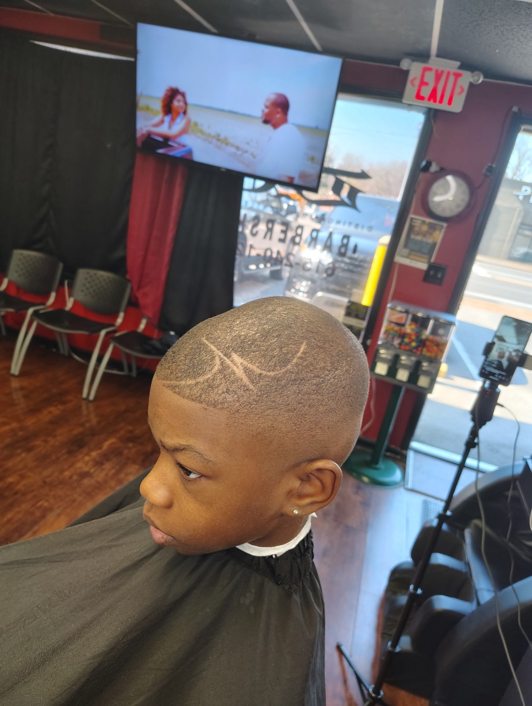 Kid's fade with a freestyle hair design