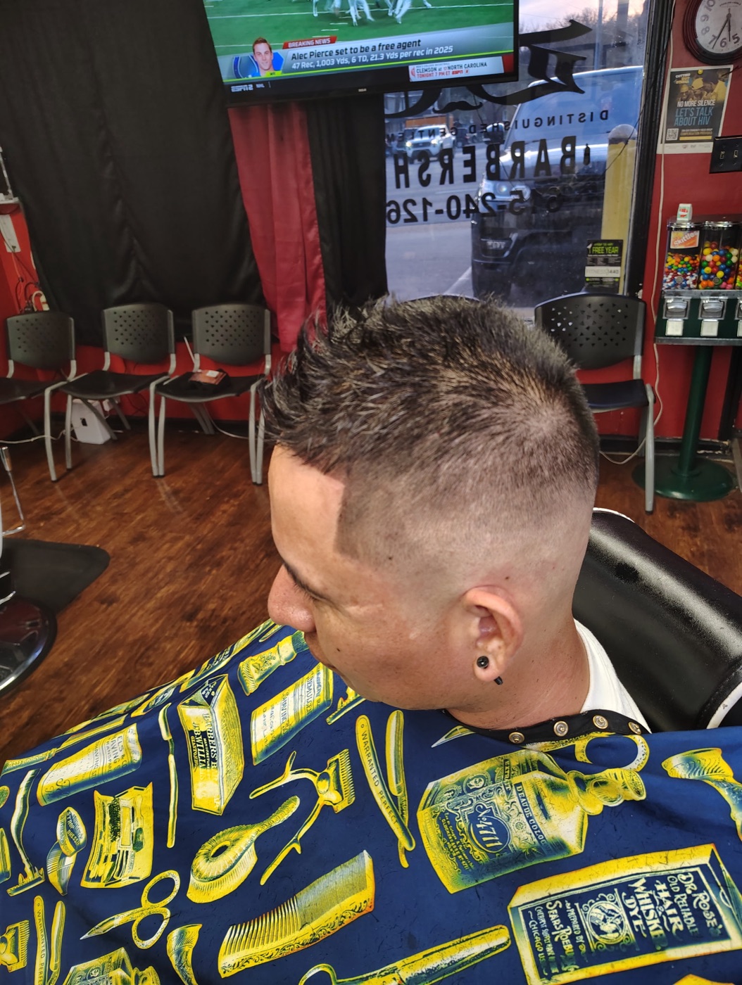 Textured spiky top with a high skin fade