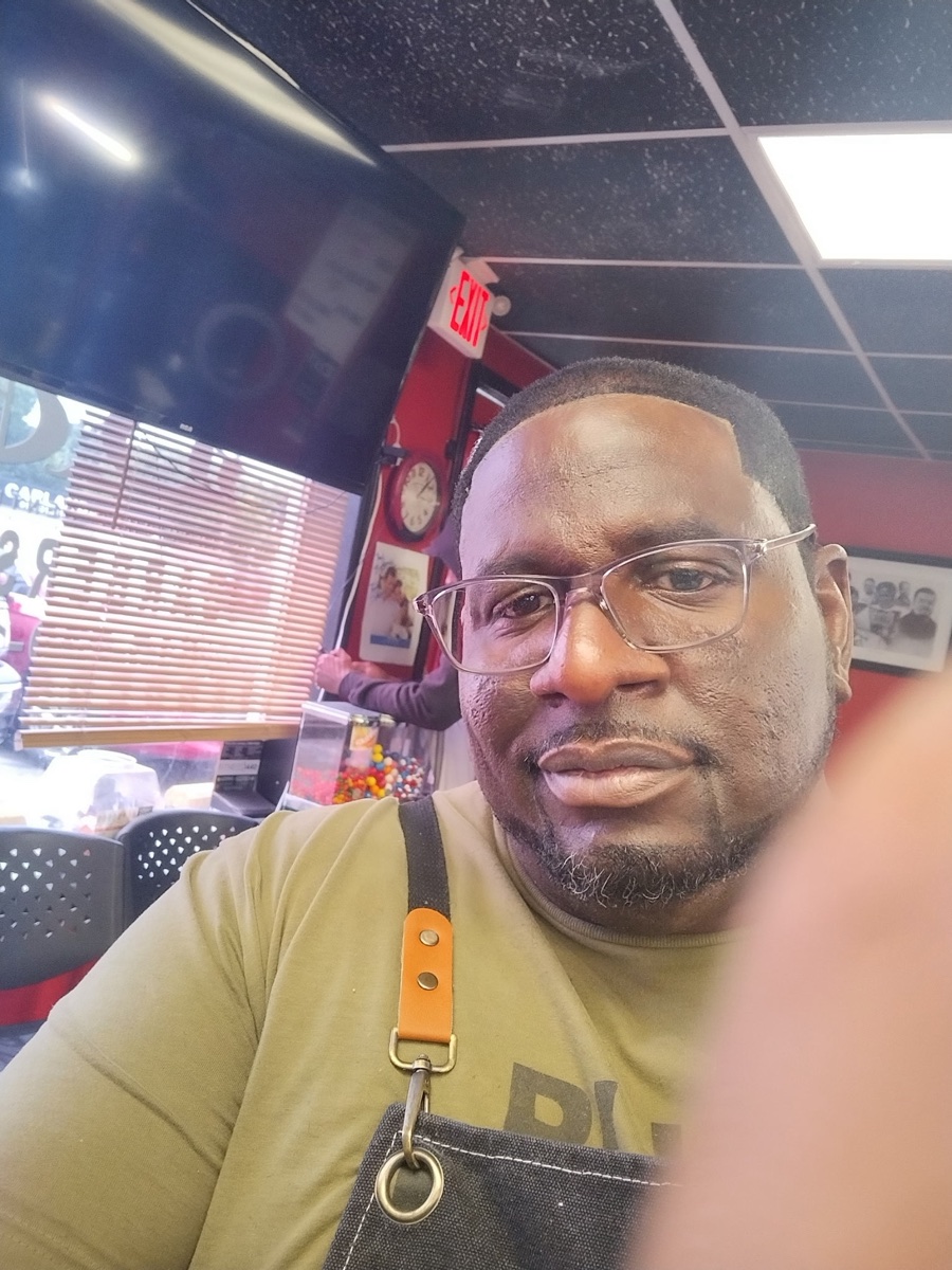 Big Steve, owner and barber at Distinguished Gentleman Barbershop
